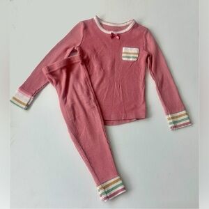Daisy Fuentes girl’s long-sleeved pajama with striped cuffs, pocked.  Size 18M.